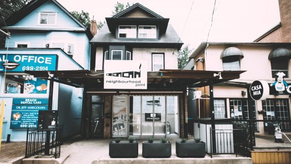 The Neighbourhood Joint store front view from the sidewalk.