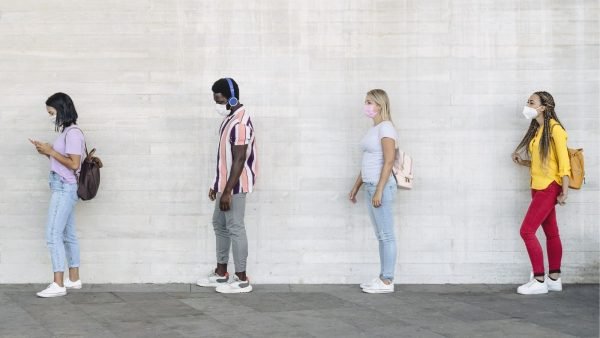 Masked customers in line