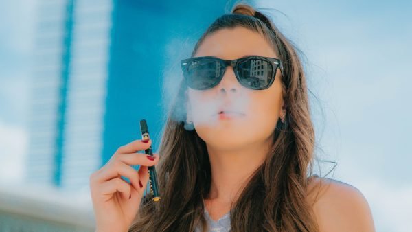 Woman with vape pen