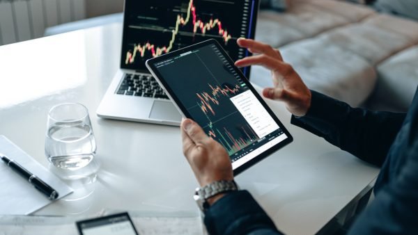 stock market on laptop screen